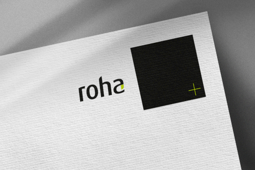 roha Büro- und Objekteinrichtung: Neues Logo designt von typneun auf strukturiertem Papier