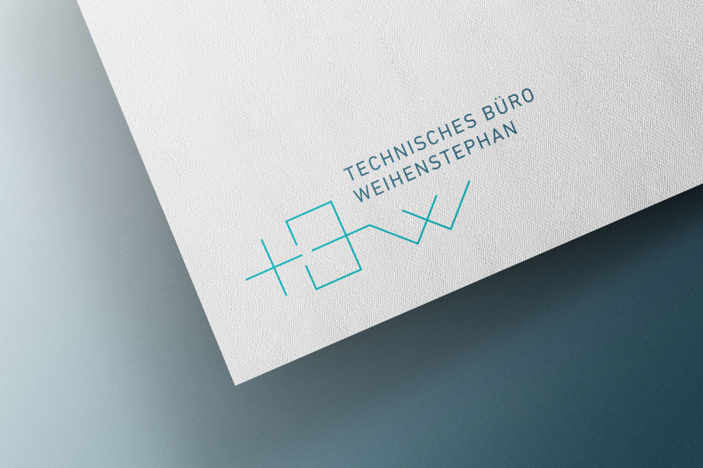 Darstellung des Logos vom Technischen Büro Weihenstephan auf einem strukturierten Papier